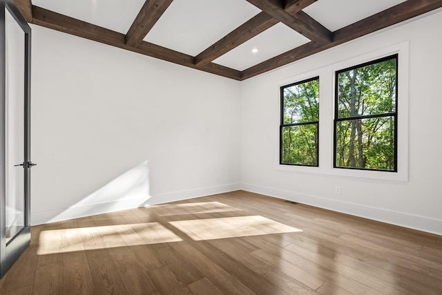 6628 Bethesda Arno Rd, Thompsons Station, TN 37179 - unfurnished room featuring beam ceiling, wood finished floors, coffered ceiling, and recessed lighting