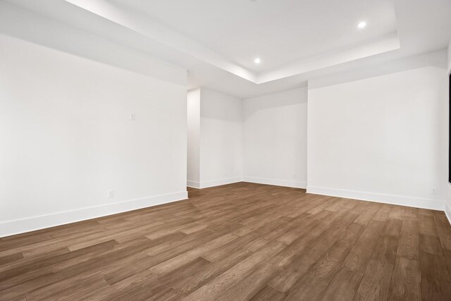 6628 Bethesda Arno Rd, Thompsons Station, TN 37179 - empty room with recessed lighting, wood finished floors, and a raised ceiling