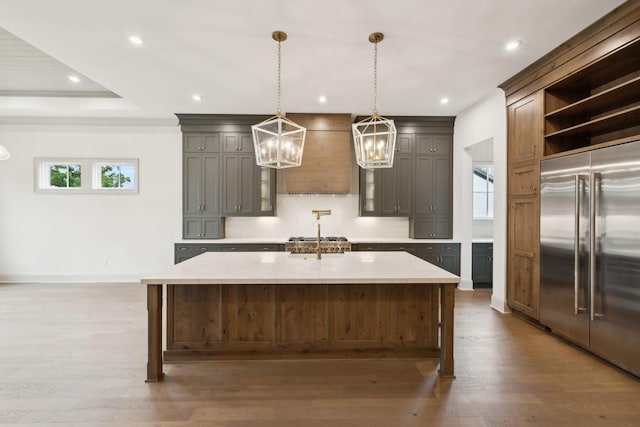 6628 Bethesda Arno Rd, Thompsons Station, TN 37179 - kitchen featuring built in refrigerator, a chandelier, open shelves, wood finished floors, and recessed lighting