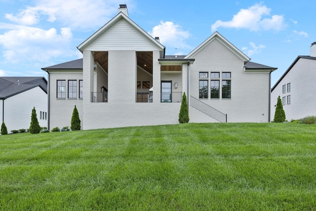 6628 Bethesda Arno Rd, Thompsons Station, TN 37179 - back of house featuring brick siding, a chimney, and a lawn