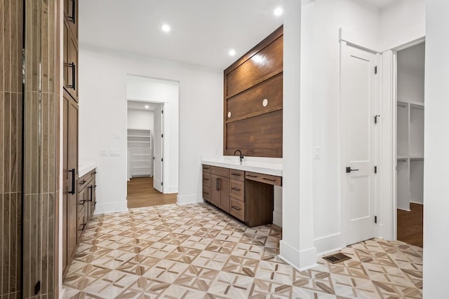 6628 Bethesda Arno Rd, Thompsons Station, TN 37179 - bathroom featuring vanity, a spacious closet, and recessed lighting