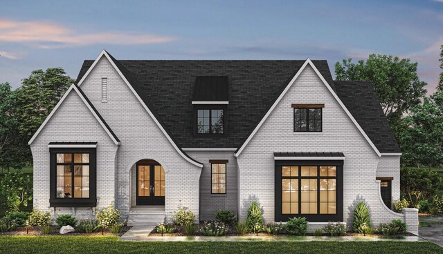 6628 Bethesda Arno Rd, Thompsons Station, TN 37179 - view of front of house featuring french doors, brick siding, and roof with shingles