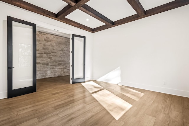 6628 Bethesda Arno Rd, Thompsons Station, TN 37179 - empty room featuring wood finished floors, beamed ceiling, and coffered ceiling