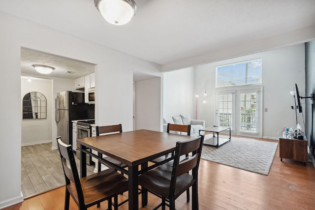 420 Elysian Fields Rd Unit C3, Nashville, TN 37211 - dining space with light wood-style flooring and baseboards