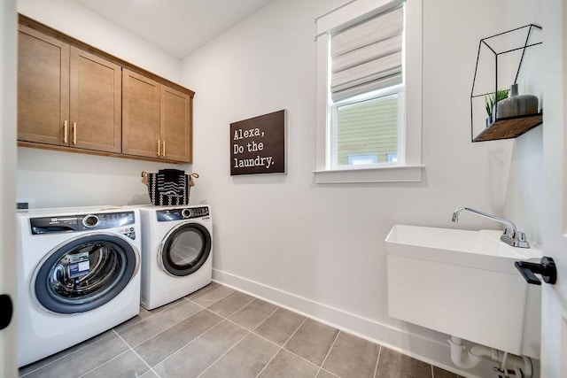 5762 Willoughby Way, Murfreesboro, TN 37129 - washroom with washer and clothes dryer, cabinet space, and light tile patterned floors
