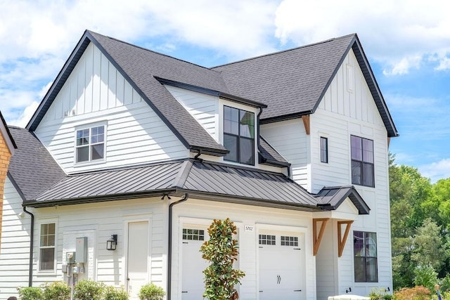 5762 Willoughby Way, Murfreesboro, TN 37129 - view of front of house with a standing seam roof, board and batten siding, a garage, and roof with shingles
