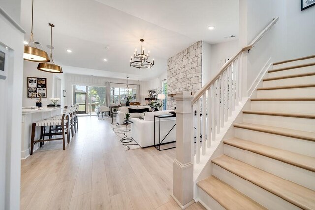 5762 Willoughby Way, Murfreesboro, TN 37129 - stairway featuring a chandelier, wood finished floors, and recessed lighting