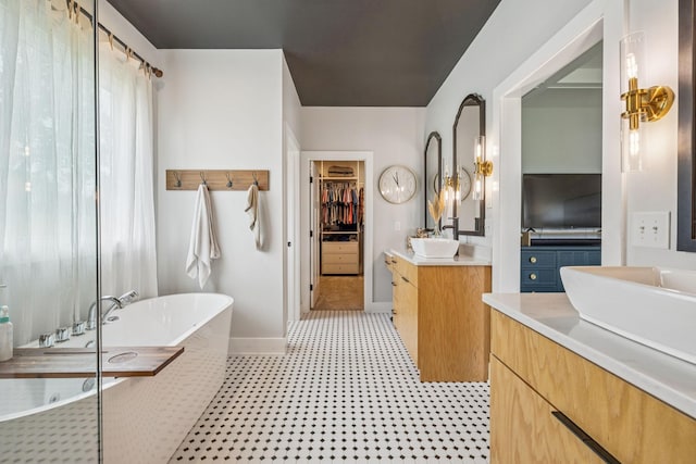 4080 Coles Ferry Pike, Lebanon, TN 37087 - full bath featuring a freestanding tub, two vanities, and a walk in closet