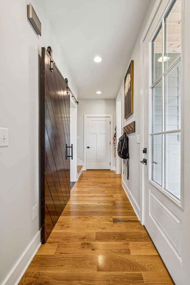 4080 Coles Ferry Pike, Lebanon, TN 37087 - corridor featuring a barn door, recessed lighting, and light wood-style flooring