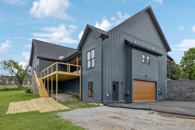 4080 Coles Ferry Pike, Lebanon, TN 37087 - rear view of property with driveway, an attached garage, a deck, stairway, and a yard