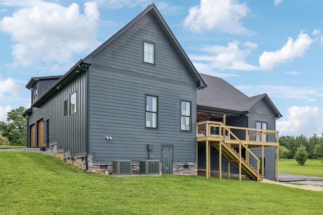 4080 Coles Ferry Pike, Lebanon, TN 37087 - rear view of house featuring stairs, a lawn, a wooden deck, and board and batten siding