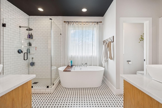 4080 Coles Ferry Pike, Lebanon, TN 37087 - bathroom with vanity, a shower stall, and a freestanding tub