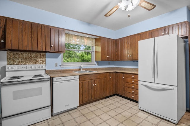 3841 Rollingwood Dr, Chattanooga, TN 37406 - kitchen with white appliances, light floors, a ceiling fan, brown cabinets, and light countertops