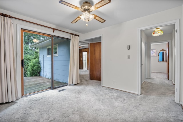 3841 Rollingwood Dr, Chattanooga, TN 37406 - unfurnished bedroom featuring access to exterior, carpet, and multiple windows