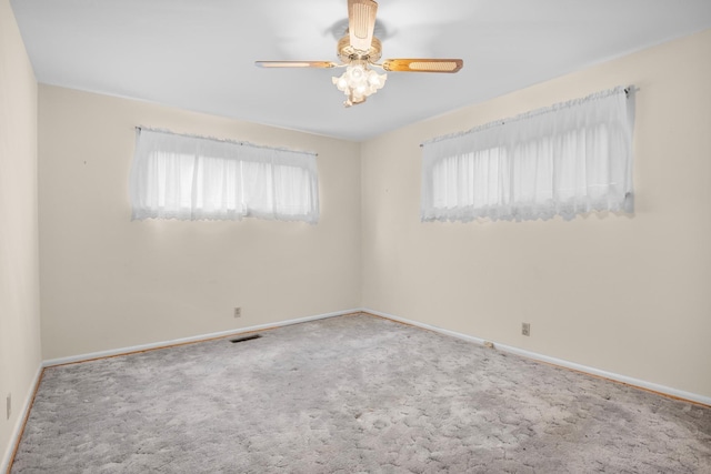3841 Rollingwood Dr, Chattanooga, TN 37406 - unfurnished room with plenty of natural light, carpet floors, and a ceiling fan
