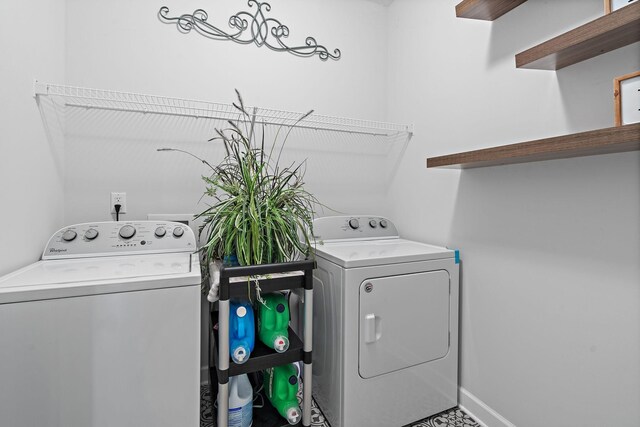 832 Green Meadow Ln, Smyrna, TN 37167 - washroom with washer and clothes dryer and baseboards