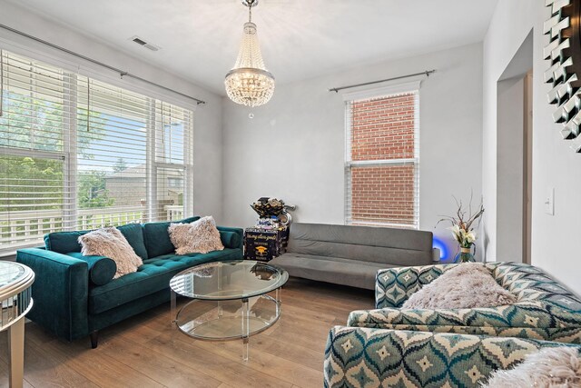 832 Green Meadow Ln, Smyrna, TN 37167 - living area featuring a chandelier and wood finished floors