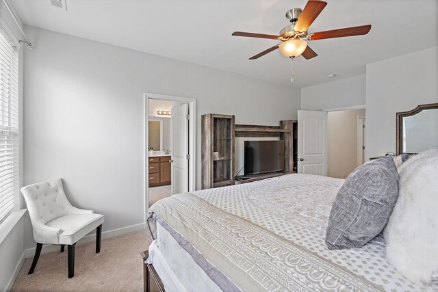 832 Green Meadow Ln, Smyrna, TN 37167 - bedroom with light colored carpet, ensuite bathroom, and a ceiling fan