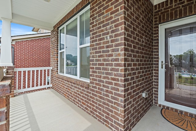 832 Green Meadow Ln, Smyrna, TN 37167 - doorway to property featuring brick siding and a porch