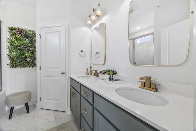 2101 Branford Pl Unit 201, Thompsons Station, TN 37179 - bathroom featuring marble look tile flooring, double vanity, and a tile shower