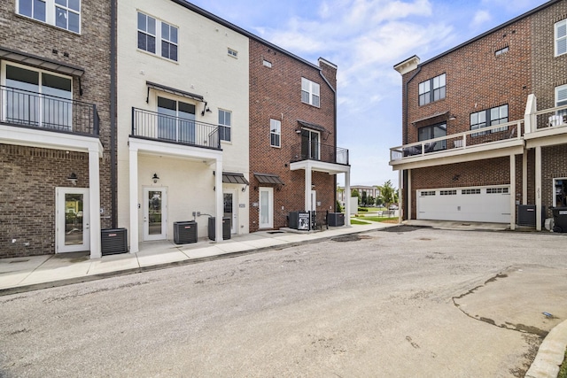 2101 Branford Pl Unit 201, Thompsons Station, TN 37179 - view of building exterior with a garage