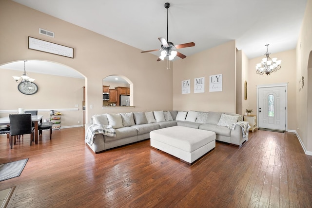 3351 Cotham Ln, Clarksville, TN 37042 - living room with a chandelier, hardwood / wood-style flooring, a ceiling fan, arched walkways, and a high ceiling