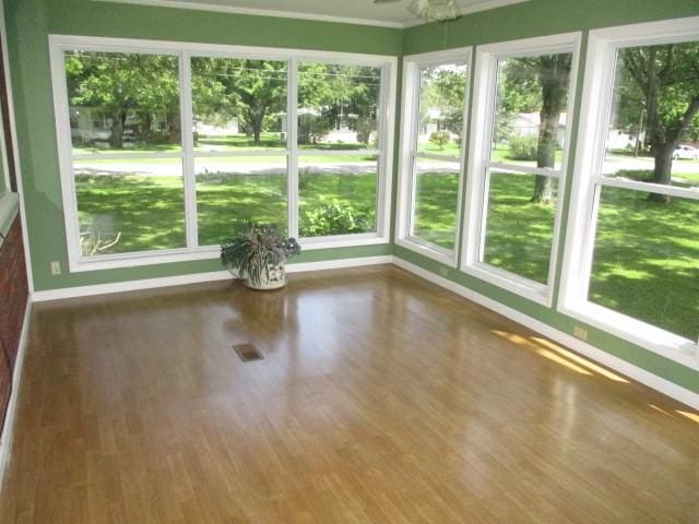 829 Kenny St, Gallatin, TN 37066 - unfurnished sunroom featuring wood finished floors and ornamental molding
