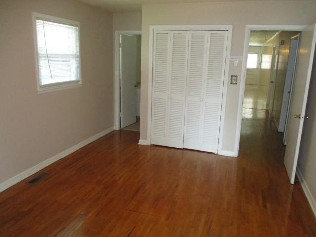 829 Kenny St, Gallatin, TN 37066 - unfurnished bedroom featuring wood finished floors and a closet