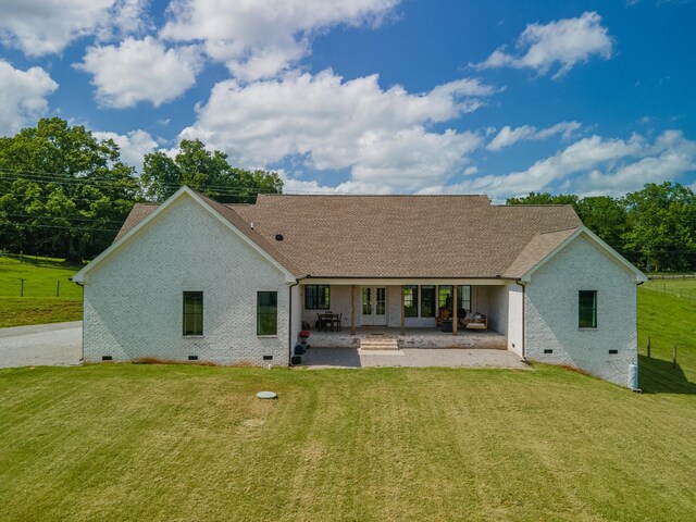 5247 Flat Creek Rd, Spring Hill, TN 37174 - back of house featuring crawl space, brick siding, a patio area, a yard, and french doors
