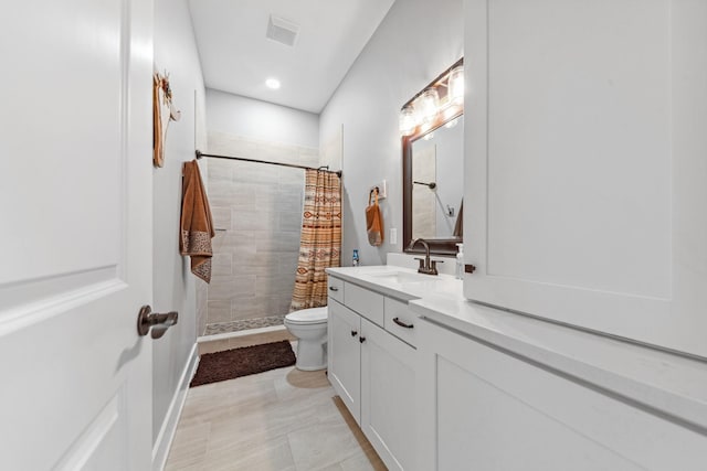 5247 Flat Creek Rd, Spring Hill, TN 37174 - bathroom with a tile shower, vanity, and recessed lighting
