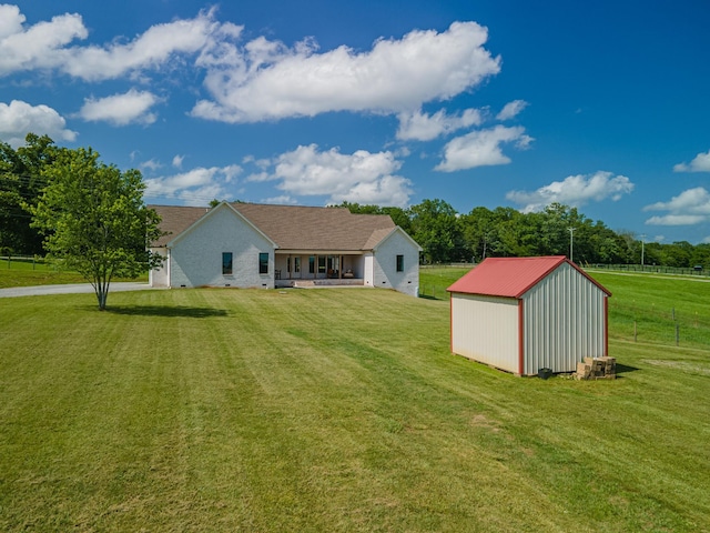 5247 Flat Creek Rd, Spring Hill, TN 37174 - back of house with an outbuilding