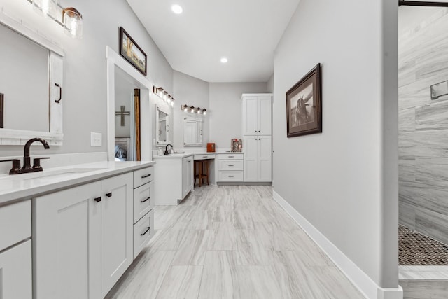 5247 Flat Creek Rd, Spring Hill, TN 37174 - bathroom with two vanities, recessed lighting, and a tile shower