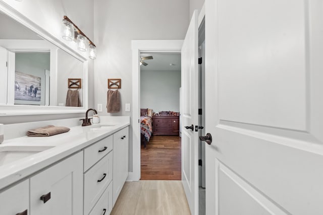 5247 Flat Creek Rd, Spring Hill, TN 37174 - full bathroom with ensuite bathroom, double vanity, and wood finished floors