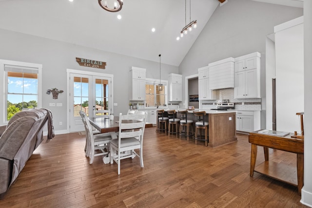 5247 Flat Creek Rd, Spring Hill, TN 37174 - dining area featuring high vaulted ceiling, dark wood-style floors, and recessed lighting