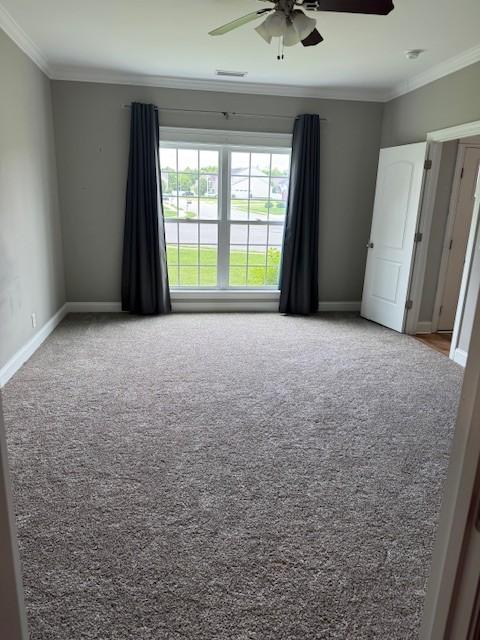 2747 Candlewick Ct, Murfreesboro, TN 37127 - empty room featuring a ceiling fan, ornamental molding, and carpet floors