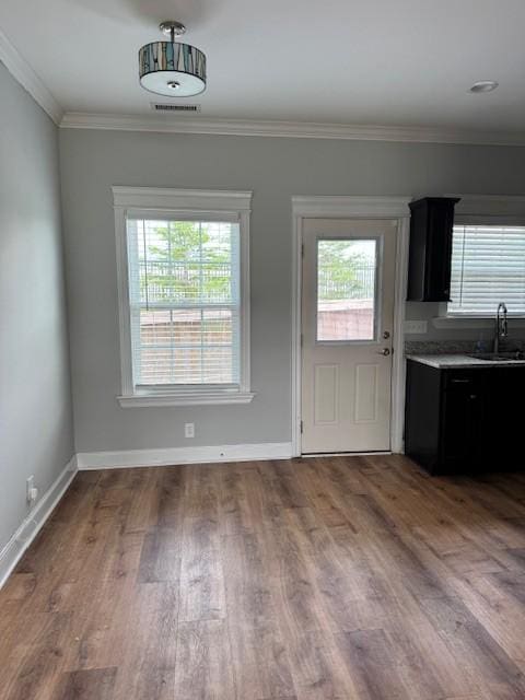 2747 Candlewick Ct, Murfreesboro, TN 37127 - unfurnished dining area with plenty of natural light, wood finished floors, and ornamental molding
