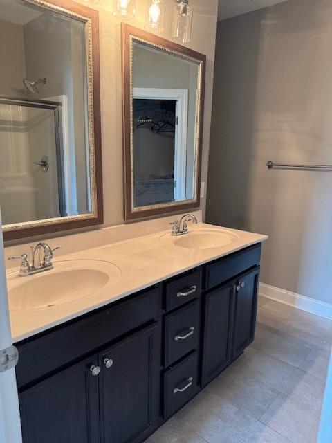 2747 Candlewick Ct, Murfreesboro, TN 37127 - full bath featuring double vanity, tile patterned floors, and a shower