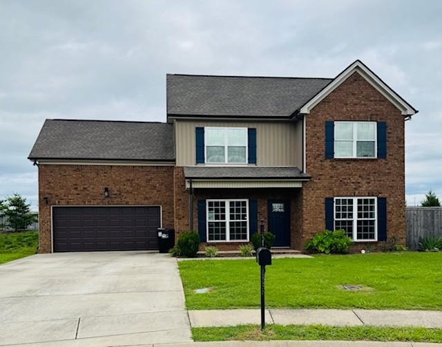 2747 Candlewick Ct, Murfreesboro, TN 37127 - traditional-style house featuring concrete driveway, an attached garage, brick siding, and roof with shingles