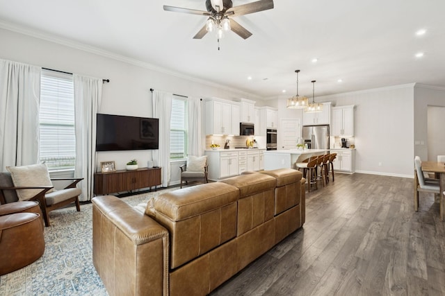 1434 Autumn Leaf Ln, Mount Juliet, TN 37122 - living area with a ceiling fan, dark wood-type flooring, recessed lighting, crown molding, and a chandelier