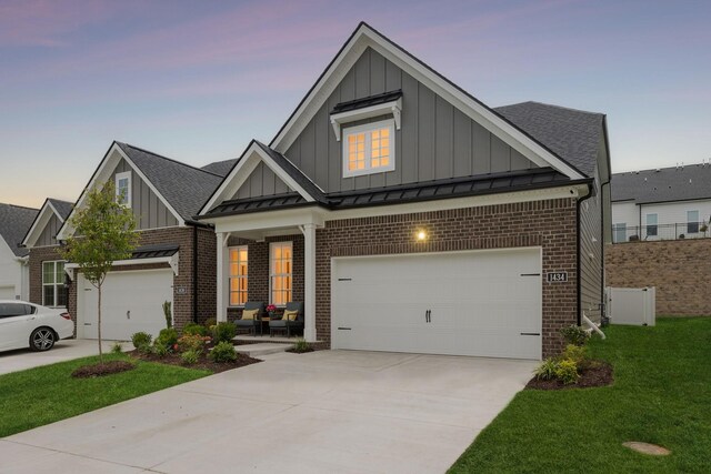 1434 Autumn Leaf Ln, Mount Juliet, TN 37122 - craftsman-style house with board and batten siding, brick siding, and concrete driveway
