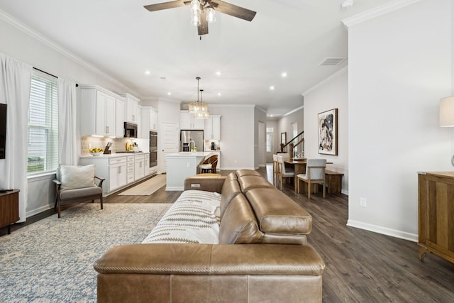 1434 Autumn Leaf Ln, Mount Juliet, TN 37122 - living room with a ceiling fan, dark wood-style flooring, crown molding, recessed lighting, and stairway