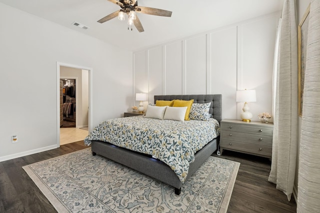 1434 Autumn Leaf Ln, Mount Juliet, TN 37122 - bedroom with dark wood-style floors, a ceiling fan, and a walk in closet