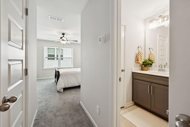 1434 Autumn Leaf Ln, Mount Juliet, TN 37122 - hallway with a sink and light carpet