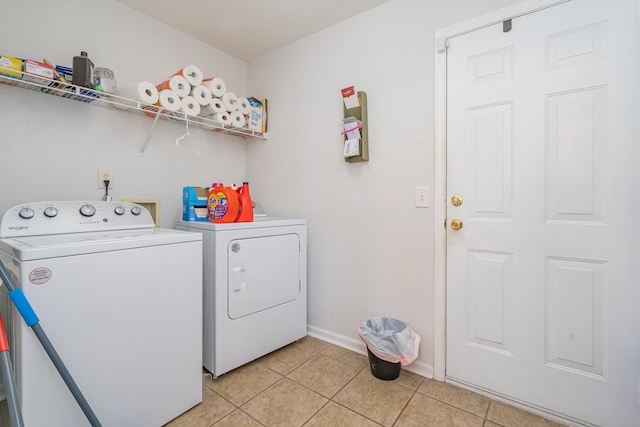982 Chesire Way, Gallatin, TN 37066 - washroom featuring separate washer and dryer and light tile patterned flooring