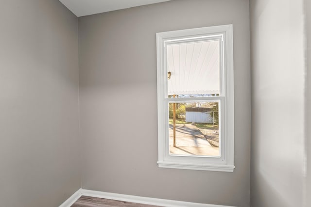 715 N High St N, Winchester, TN 37398 - spare room featuring wood finished floors and baseboards