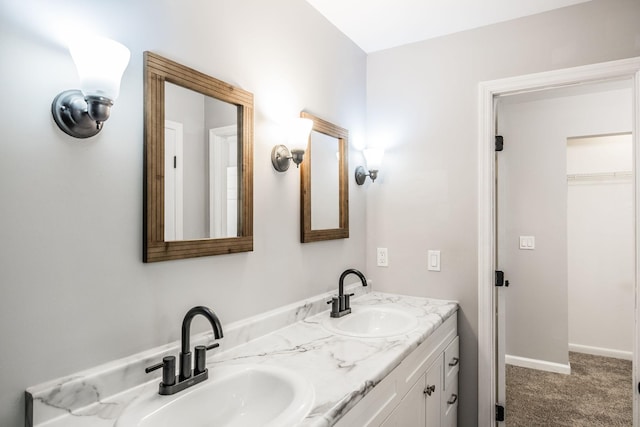 13989 Owens Chapel Rd, Springfield, TN 37172 - bathroom featuring double vanity and baseboards