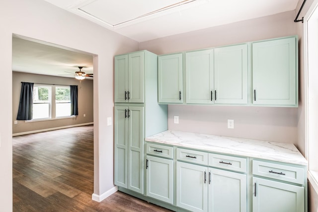 13989 Owens Chapel Rd, Springfield, TN 37172 - kitchen with dark wood-style flooring, a ceiling fan, light stone countertops, and open floor plan