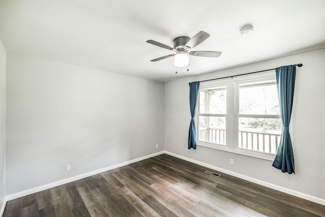 13989 Owens Chapel Rd, Springfield, TN 37172 - empty room featuring a smoke detector, dark wood-type flooring, and a ceiling fan