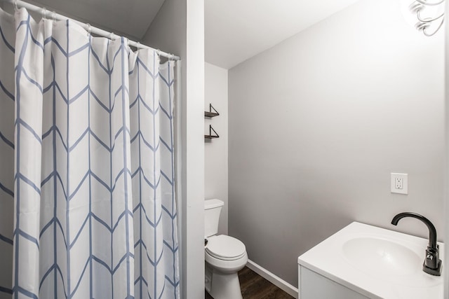 13989 Owens Chapel Rd, Springfield, TN 37172 - bathroom with wood finished floors, vanity, and a shower with curtain