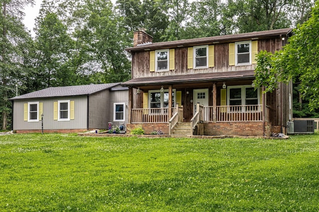13989 Owens Chapel Rd, Springfield, TN 37172 - view of front of property featuring a chimney, covered porch, and a front yard